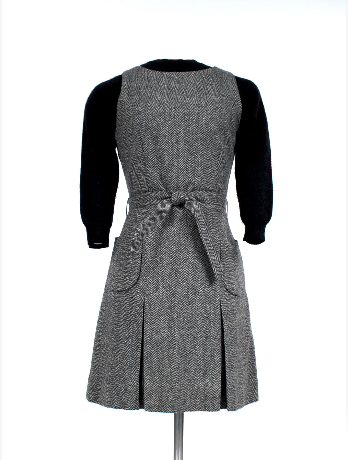 Image of Gray herringbone wool jumper dress with belt, worn as part of the Seattle World's Fair Century 21 Fashion Show, 1962